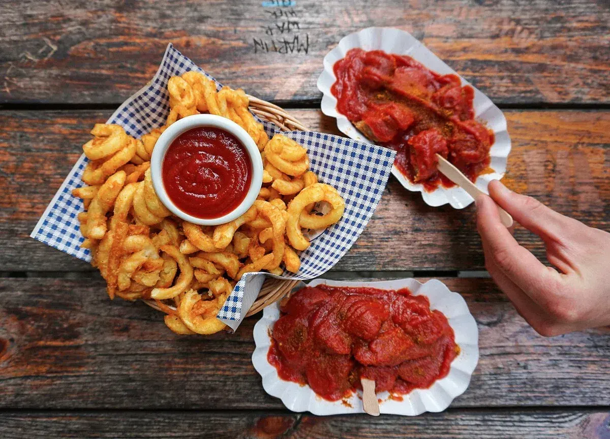 Vegan Berlin Currywurst with curly fries